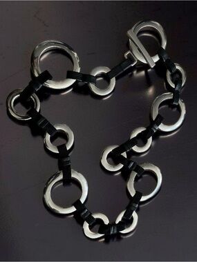 Black Leather and Silver Ring Statement Belt